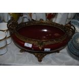 GILT METAL-MOUNTED PUCE GLAZED PORCELAIN TABLE CENTREPIECE.