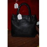 A MULBERRY SMALL BLACK LEATHER TOTE BAG WITH WOVEN LEATHER HANDLES