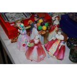 FOUR ASSORTED DOULTON FIGURES TO INCLUDE 'MISS DEMURE' HN1402, 'SOUTHERN BELLE' HN2229, 'JANET'