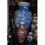 A LARGE CHINESE BLUE AND WHITE VASE, HAND PAINTED WITH CRANES IN A LANDSCAPE WITH TREES, TOGETHER