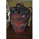 A PAIR OF LATE 19TH/ EARLY 20TH CENTURY RED LEATHER FIRE BUCKETS.