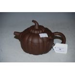 A YIXING GOURD FORM TEAPOT AND COVER.