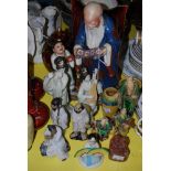 A GROUP OF CHINESE POTTERY FIGURES INCLUDING A LARGE FIGURE OF A SCHOLAR / IMMORTAL HOLDING A