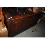 A MID 18TH CENTURY OAK PANELLED BLANKET CHEST, THE INTERIOR WITH A SMALL DRAWER COMPARTMENT TO THE