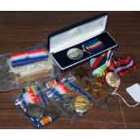 Collection of Great War and Second World War medals, to include a group of three Great War medals