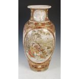 A large Japanese Satsuma pottery vase, Meiji Period, decorated with oval shaped panels enclosing