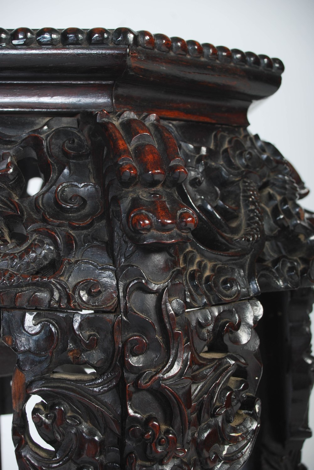 A Chinese carved darkwood jardiniere stand, Qing Dynasty, the octagonal top inset with marble, - Image 5 of 6