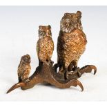 Late 19th/ early 20th century cold painted bronze desk stand in the form of a parliament of owls,