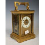 Early 20th century brass cased repeating carriage clock, with two train movement striking on a