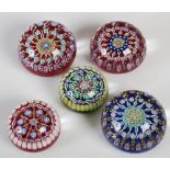 A group of five assorted Perthshire Paperweights, various size and colour combinations, all