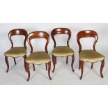 Four late 19th/ early 20th century mahogany balloon backed dining chairs, with carved balloon back