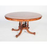 A Victorian burr walnut, satinwood and marquetry centre table, the oval shaped top with broad inlaid