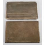 Two silver cigarette cases, one Birmingham, 1940, maker A.W, with engine turned covers, 12.5cm x 8.