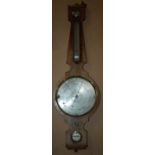 A 19th century mahogany barometer, large central dial with thermometer and levelling subsidiary