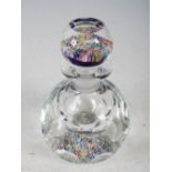 A Perthshire Paperweight clear glass ink bottle and stopper, decorated with colourful millefiori