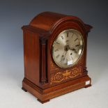 Early 20th century Scottish mahogany and marquetry mantel clock, the case of arched form with column