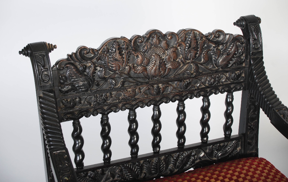 A pair of matched Anglo-Indian ebony armchairs, mid 19th century, possibly Ceylonese, the frames - Image 6 of 10