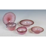 A collection of Monart and Vasart glass, all mottled purple to pink glass; a UB bowl with gold