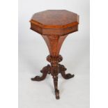 A 19th century rosewood and marquetry work/ sewing table, the octagonal top in laid with a marquetry