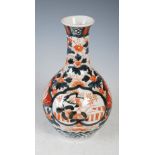 Japanese Imari porcelain bottle vase, late 19th/ early 20th century, decorated with inverted heart-