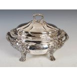 A 19th century Sheffield plate twin handled tureen and cover, engraved with Armorial crest,