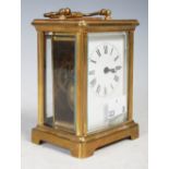 Early 20th century brass cased carriage clock, with Roman numeral dial.
