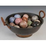 A group of twenty-four 19th century Scottish pottery carpet bowls, with sponge-printed, striped