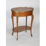 An early 20th century French Louis XVI style marquetry side table, of oval form with a pierced brass