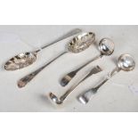 Set of three 19th century Edinburgh silver sauce ladles, makers mark WC, together with a pair of