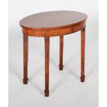 An early 20th century oval occasional table, the top in well-figured satinwood with walnut cross-