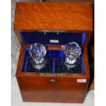 Late 19th/ early 20th century oak decanter box made by 'Army and Navy', fitted with two square cut