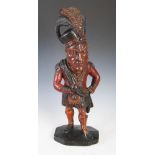 A late 18th/ 19th century carved and painted wood tobacco advertising figure in the form of a