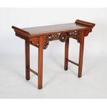 A Chinese darkwood altar / rectangular table, Republic period, the rectangular top with curved ends,