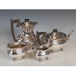 A mid 20th century four piece silver tea set, Sheffield, 1958, makers mark of E.V, comprising