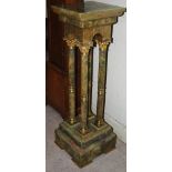 A late 19th / early 20th Century onyx and gilt metal mounted quadruple Corinthian column pedestal,