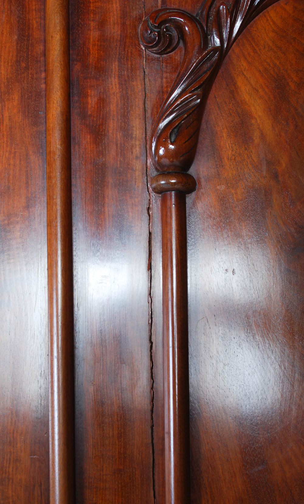 A late 19th century mahogany triple section wardrobe, with a rectangular cavetto pediment atop three - Image 6 of 6