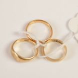 A 22ct gold ring, 2.9 grams, and two 18ct gold rings, 5.7 grams