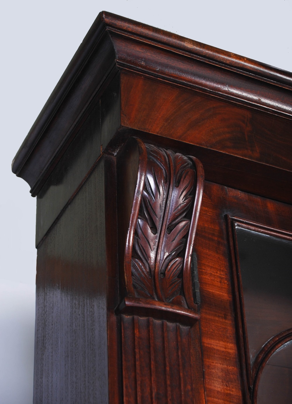 A 19th century mahogany bookcase of slender proportion, the large glazed doors flanked by two reeded - Image 4 of 4