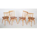 Six Ercol chairs, four in the style with straight back rails and three straight splats, the other