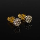 A pair of yellow and white metal diamond cluster earrings, 0.6cm diameter.