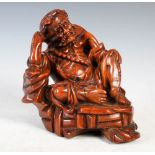 Japanese carved wood figure of Sennin, late 19th/ early 20th century, 16cm high x 15.5cm wide.