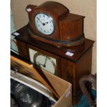 An Art Deco period burr walnut mantel clock, of rectangular form with plinth top and base, with