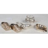 Collection of Continental silver items, to include a pair of clogs, quatrefoil ashtray embossed with