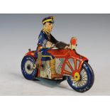 An early 20th century American Marx-Balloon tinplate clockwork Police motorcycle, with transfer