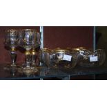 Group of late 19th/ early 20th century gilt cut glass drinking glasses and bowls, to include five