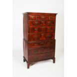 A late 18th century walnut and oak chest on chest, the front with crossbanded and figured walnut