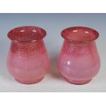 A pair of Monart vases, shape RA, mottled purple and pink with gold coloured inclusions, 17cm high.