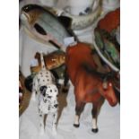 Four ceramic animal figures, including a Beswick figure of a salmon numbered 2066, a Beswick