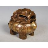 Chinese gilt metal koro and cover in the form a shishi dog, late 19th/ early 20th century, 10.5cm