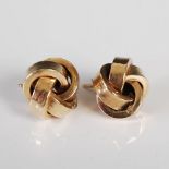 A pair of yellow metal knot earrings, marks rubbed, gross weight 2.7 grams, approximately 1.4cm